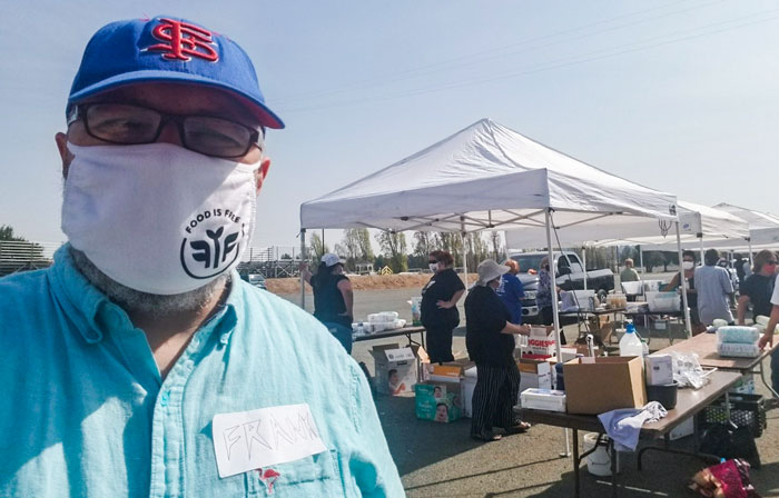 Towill's Frank Borges at a FIFS food distribution event